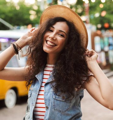 photo-of-happy-european-woman-18-20-with-curly-ZDJ6MN5.jpg